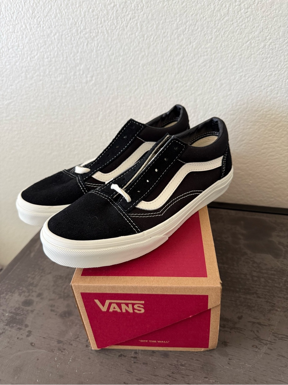 Vans Black and White Classic Slip-On Sneakers